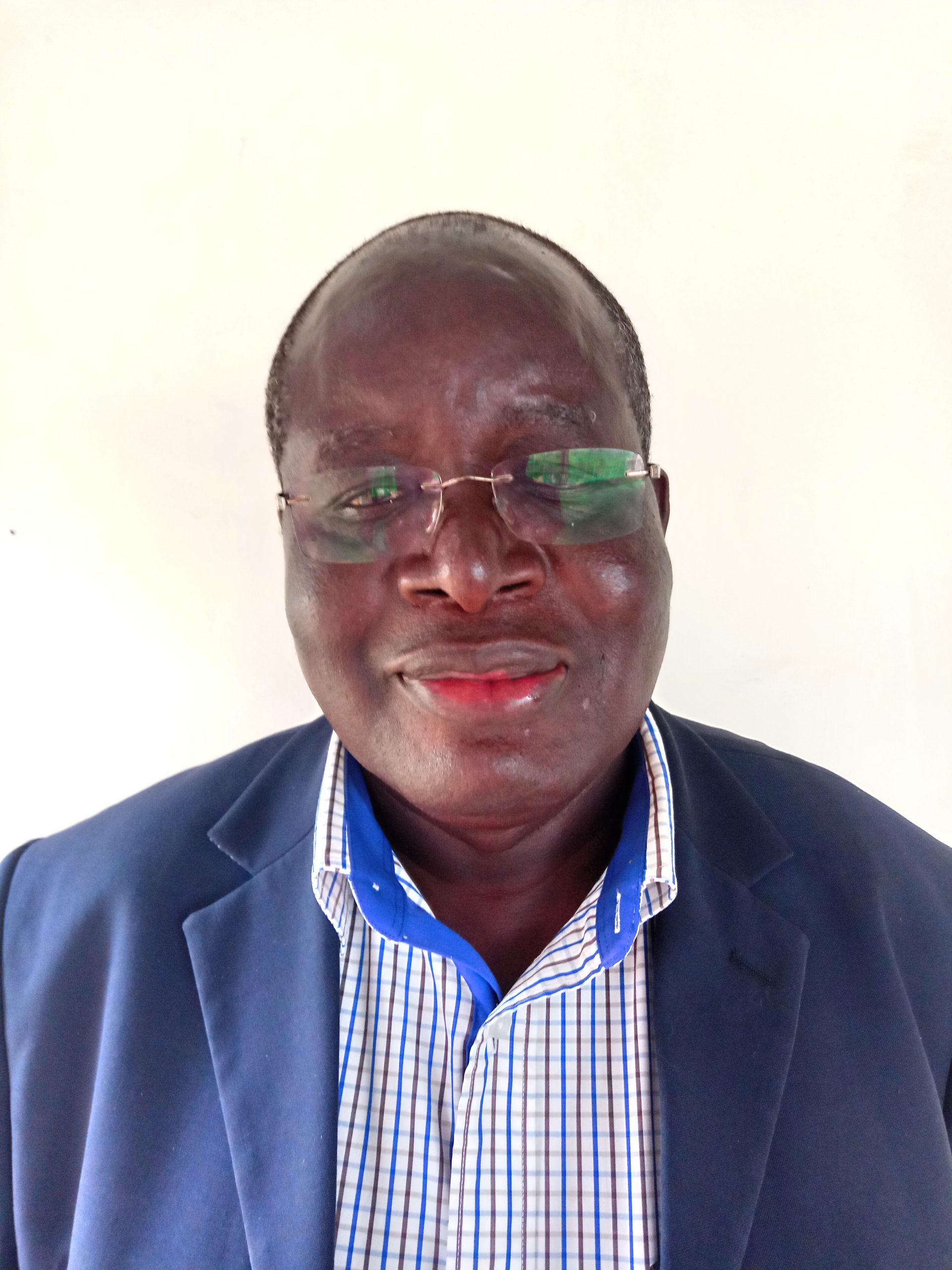 Dr. Charles Were